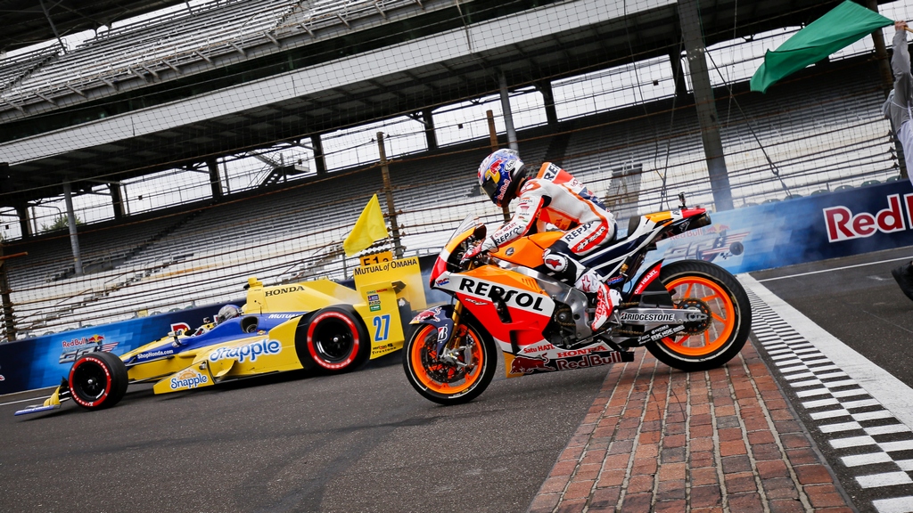 Brickyard hosts epic showdown between a MotoGP bike and an IndyCar