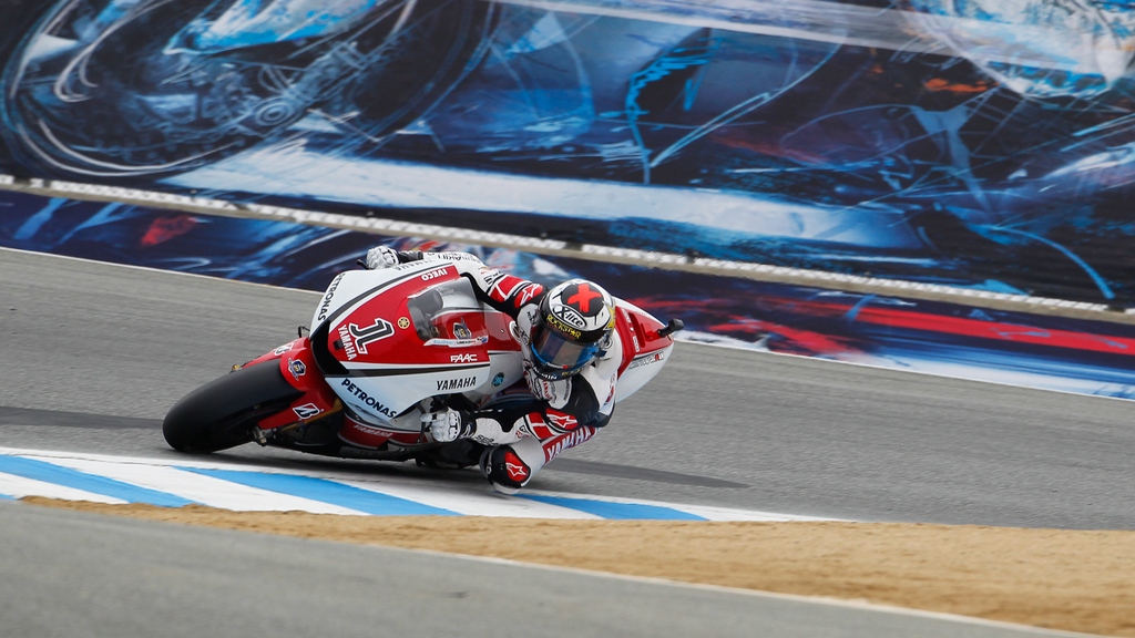 MotoGP: Lorenzo blazes into pole position unscathed after morning crash