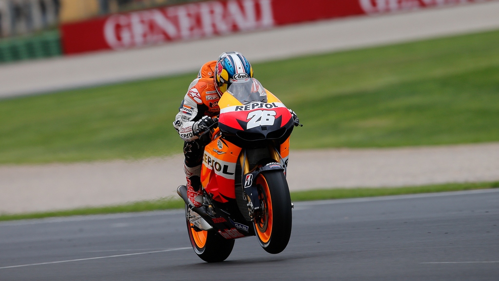MotoGP: Pedrosa wins dramatic wet Valencian GP starting from the pitlane, as Stoner bids farewell in his final GP race