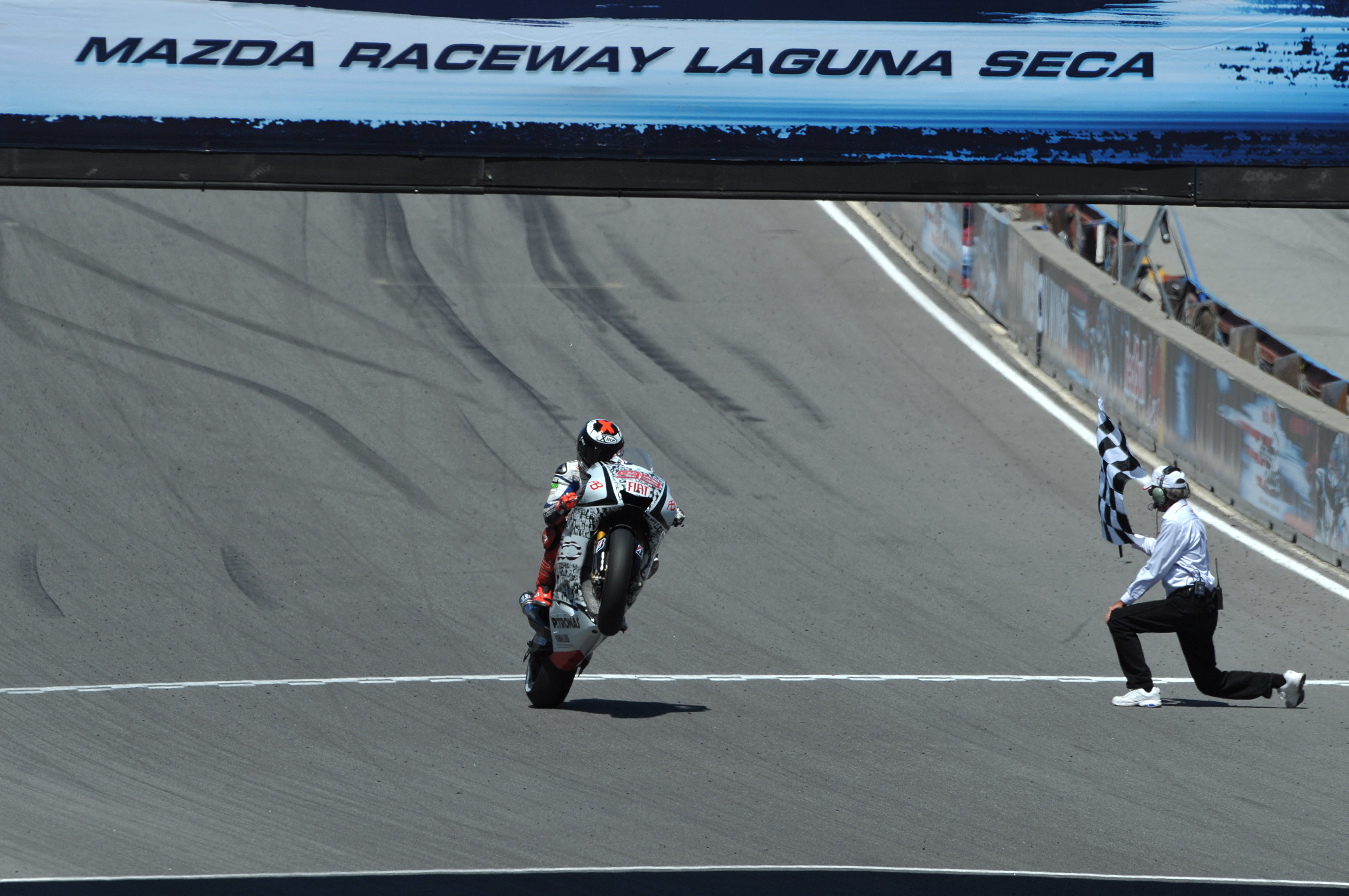 MotoGP: Lorenzo wins and Rossi suffers in pain as he clinches third at Laguna Seca