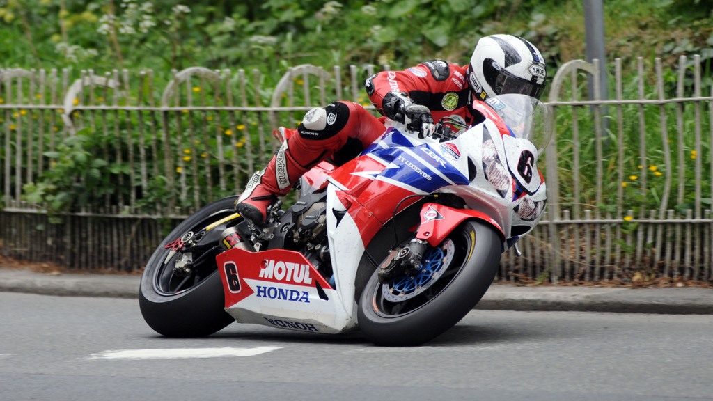 IOM TT: Sensational victory for Michael Dunlop as McGuinness sets new lap record in Superbike Race